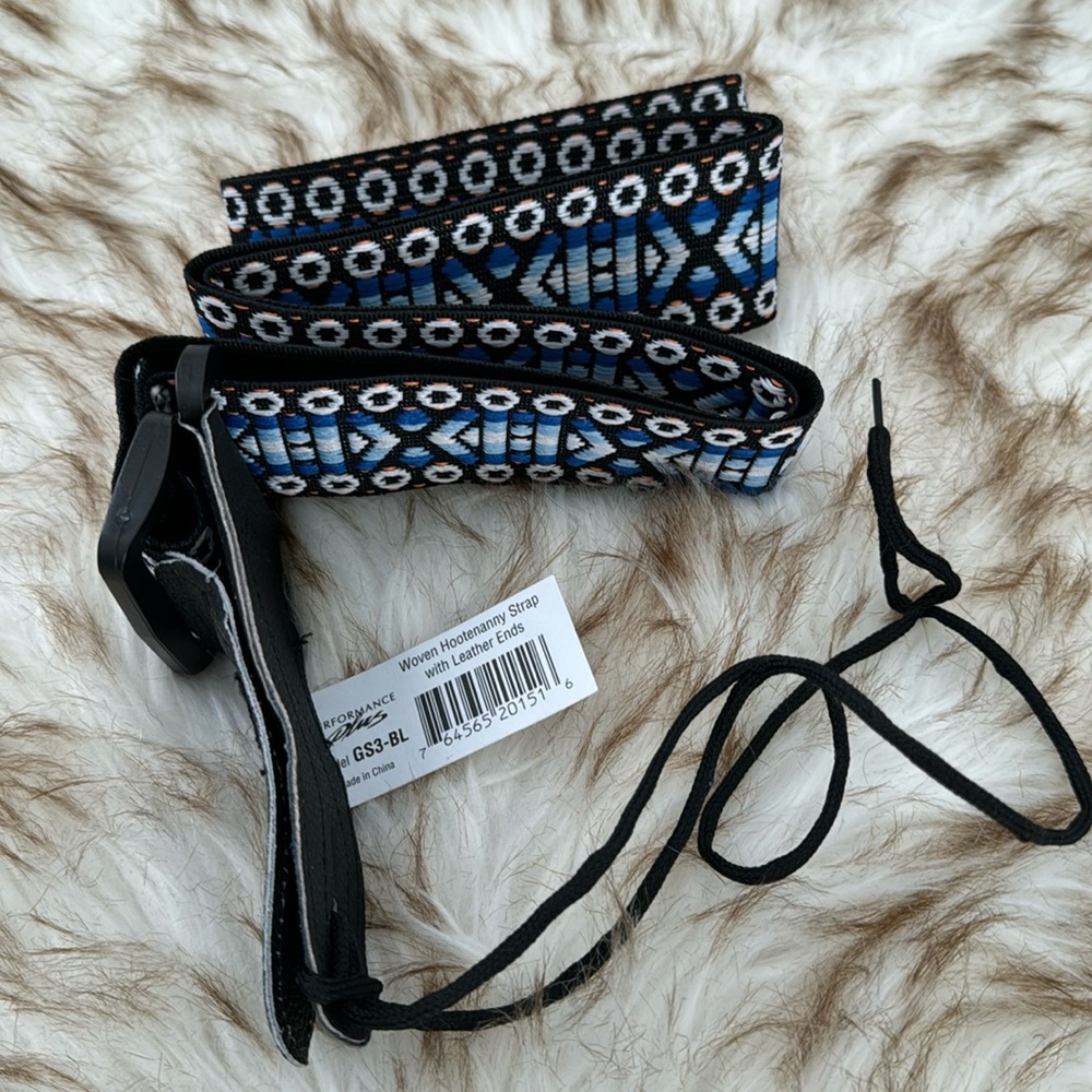 New woven hootenanny strap with leather ends